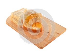 Bread with jam on a board