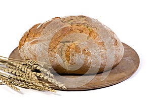 Bread loaf with wheat isolated 1