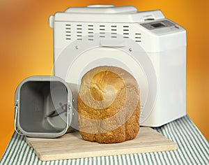 Bread machine making fresh bread at home.