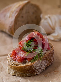 Bread with meat and tomato sauce