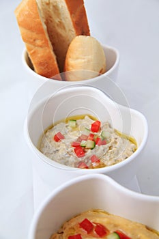 Bread onion sauce in bowl, close up white background