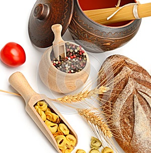 Bread, pasta, ravioli and spices isolated on white background