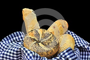 Bread with poppy seeds, sesame bread, olives and b