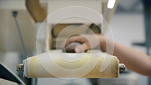 Bread production line. Scene. Food factory conveyor belt. Bread loaf on manufacturing line at food plant. Loaf of bread