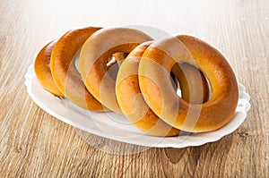 Bread rings baranka in dish on table photo