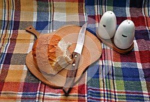 Bread with salt and pepper shakers