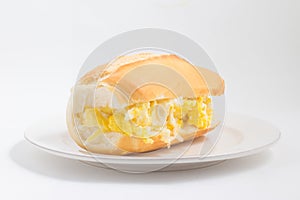 Bread with scrambled egg. Brazilian Pao com ovo photo