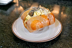 Bread with scrambled eggs and truffle mushroom