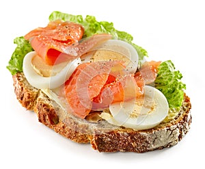 Bread slice with egg and salmon