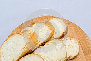 Bread and slice of bread,wooden background for design