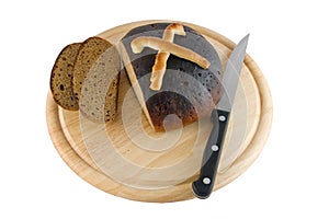 Bread sliced on board