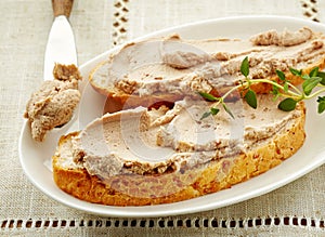 Bread slices with liver pate photo