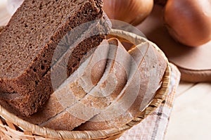 Bread slices in wicker basket.