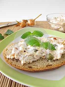 Bread spread with tuna and cream cheese