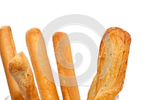 Bread stick on cup isolated on white