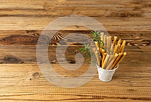 Bread Sticks on Table, Salted Breadstick, Crispy Grissini, Dry Homemade Pretzel on Wooden Background