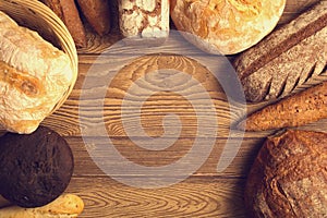 Bread in stock on a wooden table