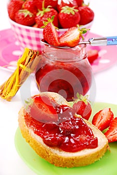 Bread with strawberry confiture