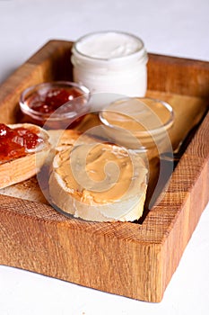 Bread toast with jelly jam and peanut butter. Sandwich