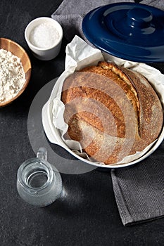 bread, wheat flour, salt and water in glass jug