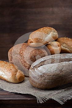 Bread on wooden background vertical