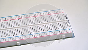 Breadboard electronics equipment mockup plate. DIY project arduino programming