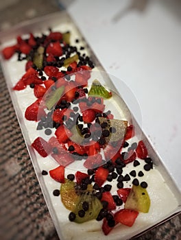 Breadcake with fuits dan chocolate topping