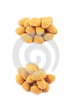 Breadcrumb coated nut pile isolated