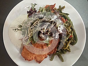 Breadcrumbed Hake, French Beans And Salad photo