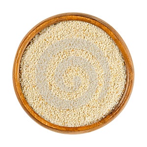 Fine breadcrumbs, also breading or crispies in wooden bowl photo
