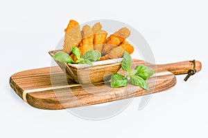 Breaded Chicken Inner Fillet on a White Background,Chicken Breaded Raw Meat.Chicken Breaded Fillet. Breaded chicken