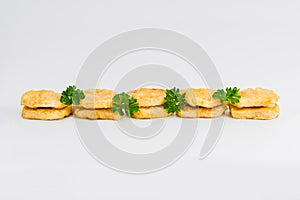 Breaded Chicken nuggets Fillet with salad on a White Background,food at home. Fast homemade food.Chicken breaded