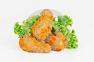 Breaded Chicken wings with salad on a White Background,food at home.Fast homemade food.Chicken Breaded Raw Meat. Fast