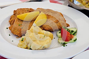 Breaded cordon bleu of calf with potato salad