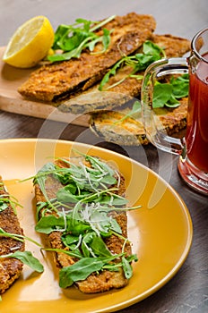 Breaded eggplant parmesan and arugula