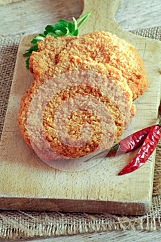 Breaded escalope on a table