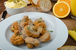 Breaded fried mushrooms with juice