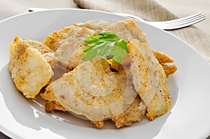 Breaded hake fillets