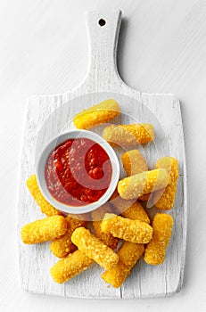 Breaded mozzarella cheese sticks with tomato basil sauce