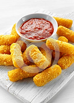 Breaded mozzarella cheese sticks with tomato basil sauce