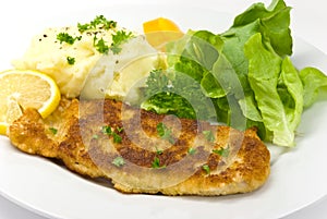 Breaded pork chop with lettuce