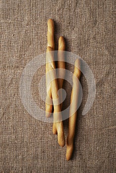 Breadsticks on burlap textile
