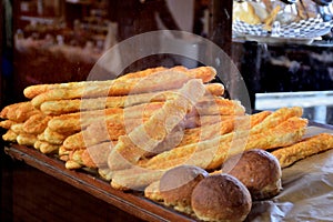 Breadsticks cheese and loaves bread
