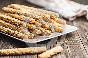 Breadsticks grissini. Bread sticks with sesame seeds