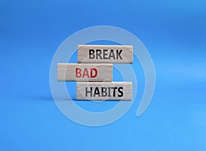 Break bad habits symbol. Concept words Break bad habits on wooden blocks. Beautiful blue background. Medicine and Break bad habits