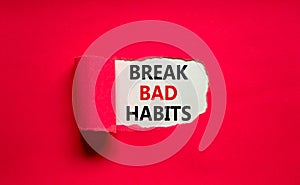 Break bad habits symbol. Words `Break bad habits` appearing behind torn purple paper. Beautiful purple background. Business,