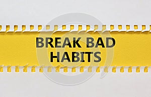Break bad habits symbol. Words `Break bad habits` on and white yellow paper. Beautiful yellow background. Business, psychology a