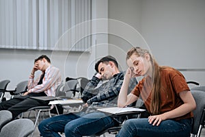 A break between classes in high school. Students rest and sleep in the classroom because of the large number of lessons
