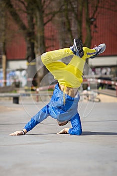 Break dance movement, performer on the street, Playground.