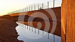 Break wall at sunset